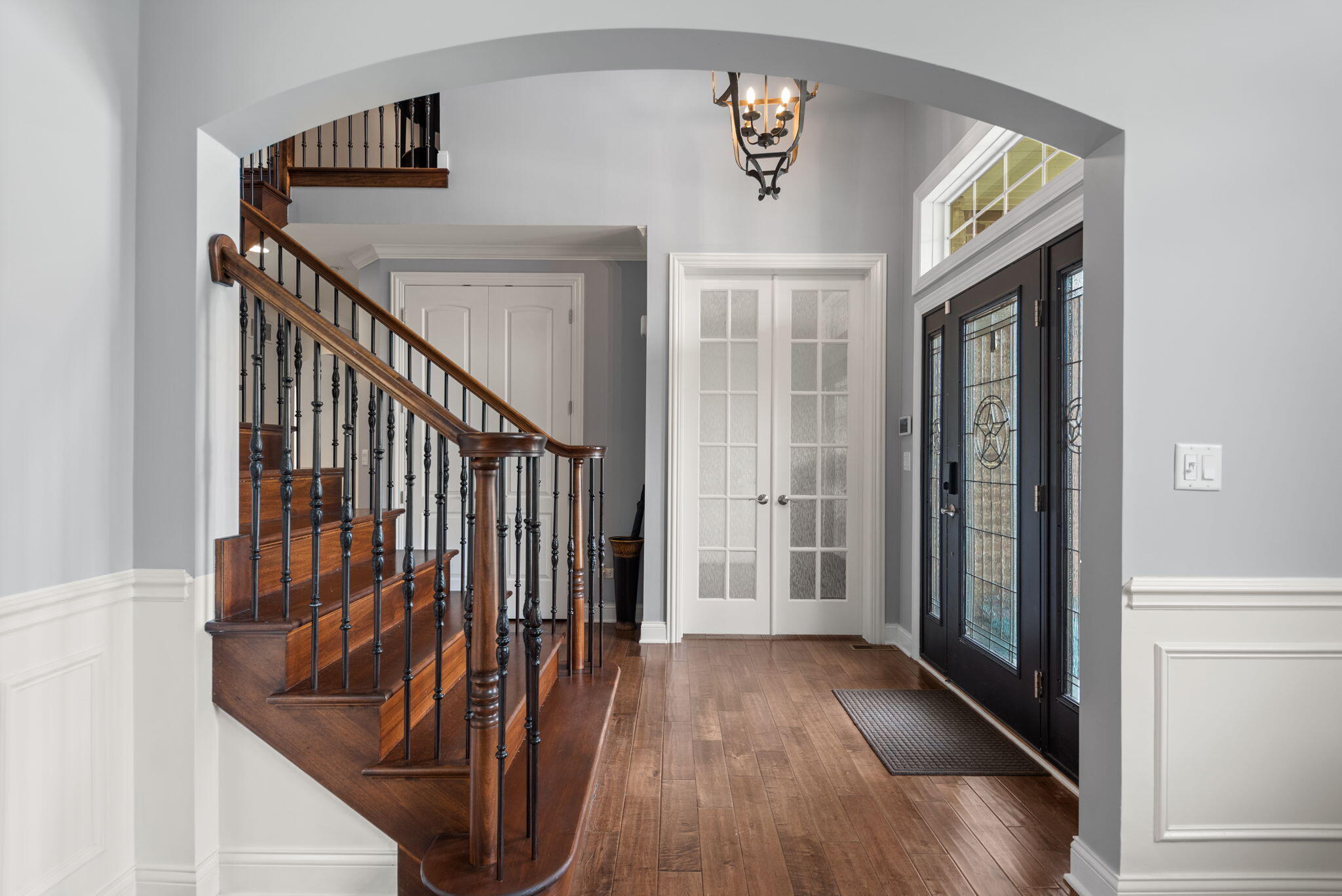 9080 Winding Trail St. John, IN 46373 - Photo 7 of 34 a view of entryway with stairs and wooden floor