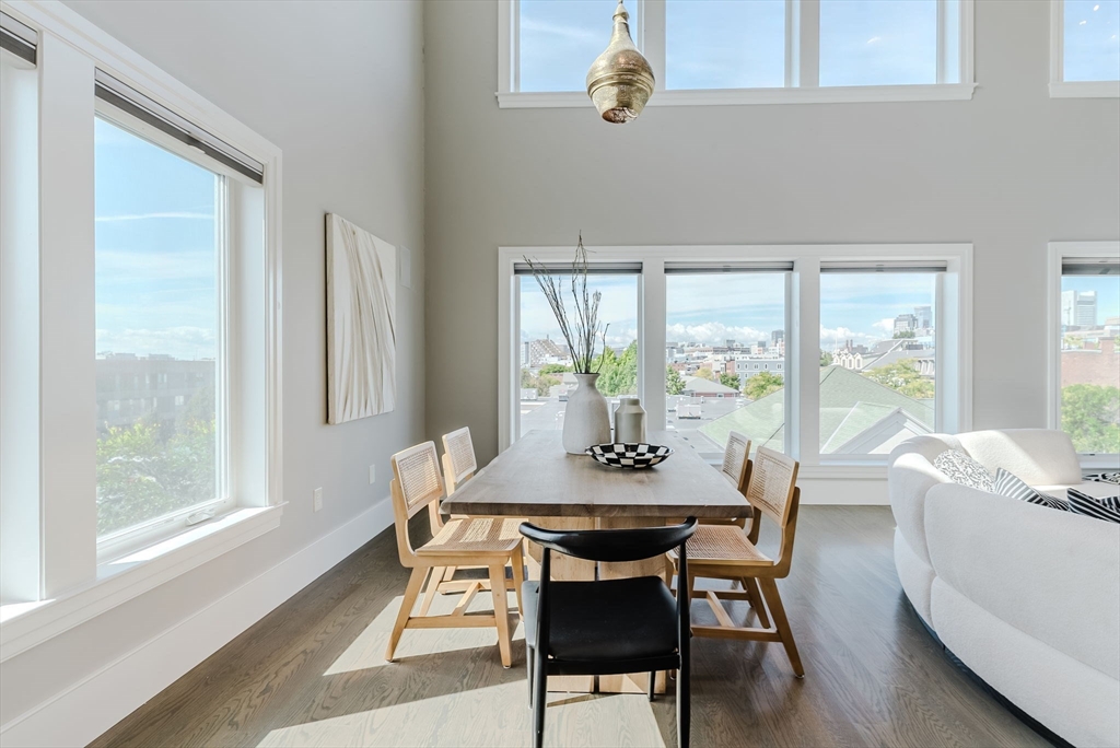 247 D Street, Unit 8 Boston, MA 02127 - Photo 3 of 42 a view of a dining room with furniture window and outside view