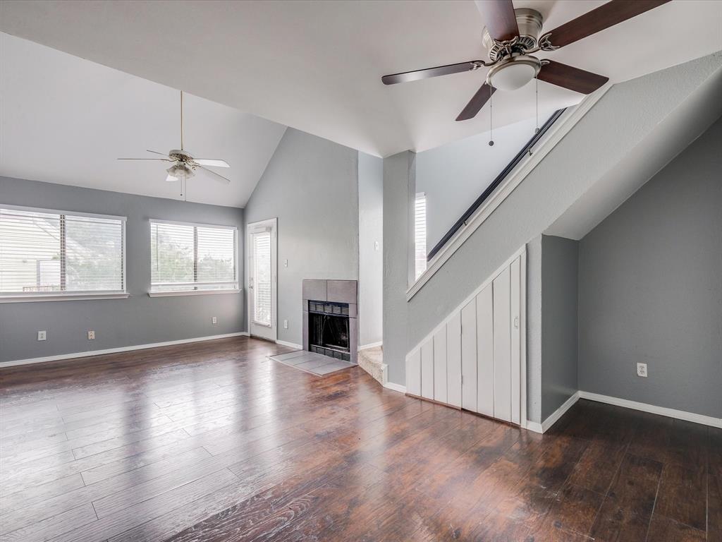 9835 Walnut Street, Unit 204 Dallas, TX 75243 - Photo 1 of 1 wooden floor in an empty room with a window