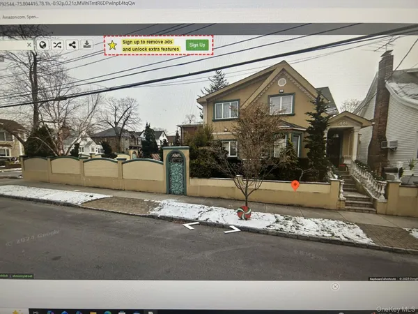 a view of a house and a street