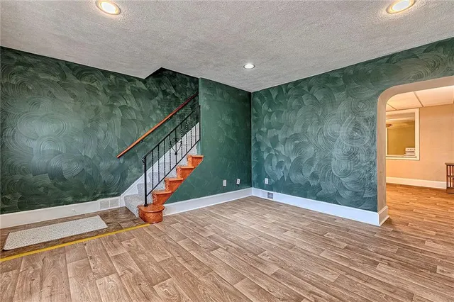 a view of a dining room with furniture and window