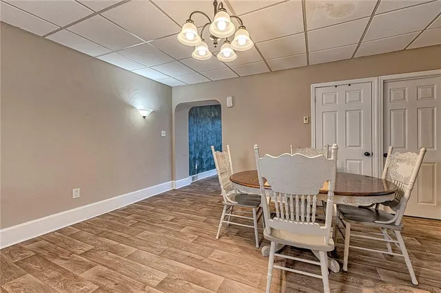 a view of kitchen with wooden floor