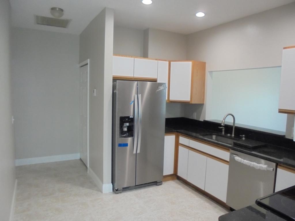 4009 Gator Trace Road Fort Pierce, FL 34982 - Photo 29 of 44 KIT TO GARAGE