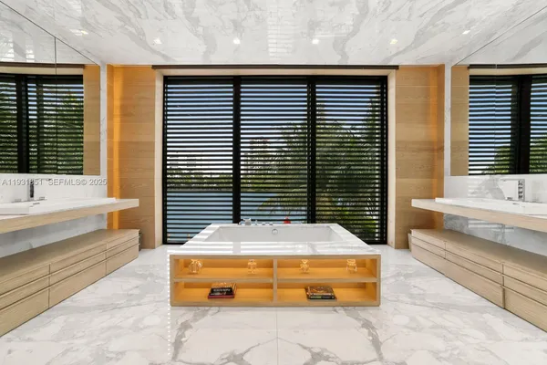 a bathroom with sink and bathtub