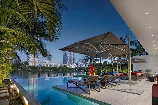a view of a chairs and tables in the patio