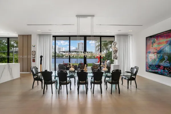 a view of a dining room with furniture window and outside view