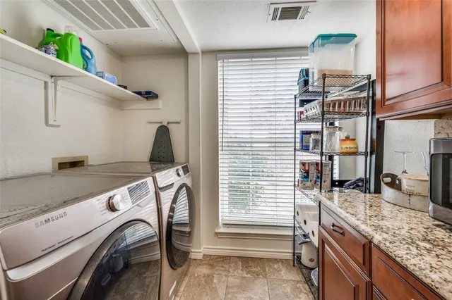 a view of utility room and sink