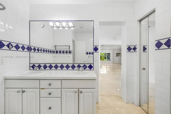 a bathroom with a shower and a toilet