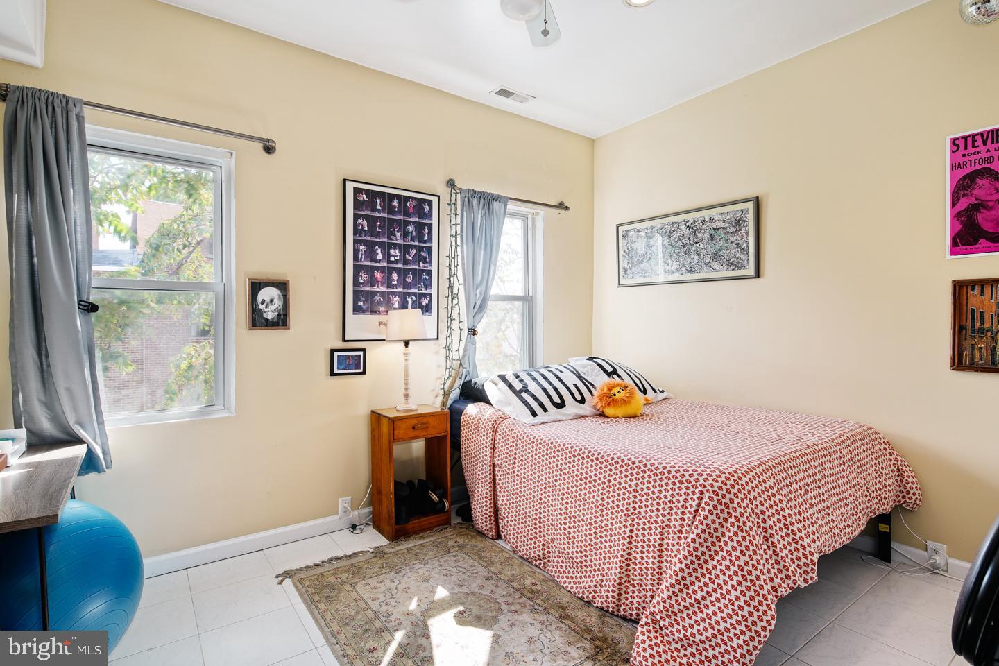 620 South 3rd Street, Unit 3 Philadelphia, PA 19147 - Photo 5 of 11 a bedroom with a bed and wooden floor