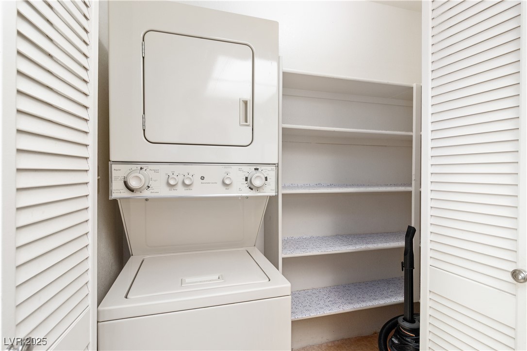 3550 Bay Sands Drive, Unit 1050 Laughlin, NV 89029 - Photo 14 of 71 Laundry area with stacked washer and clothes dryer