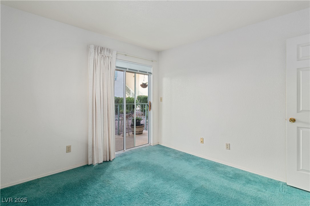 3550 Bay Sands Drive, Unit 1050 Laughlin, NV 89029 - Photo 16 of 71 Carpeted Primary bedroom featuring baseboards