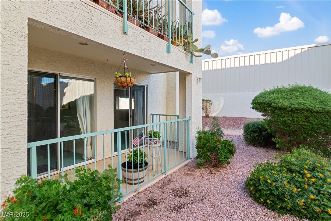 3550 Bay Sands Drive, Unit 1050 Laughlin, NV 89029 - Photo 30 of 71 View of the back of the ground floor home's building exterior with the covered patio in frame