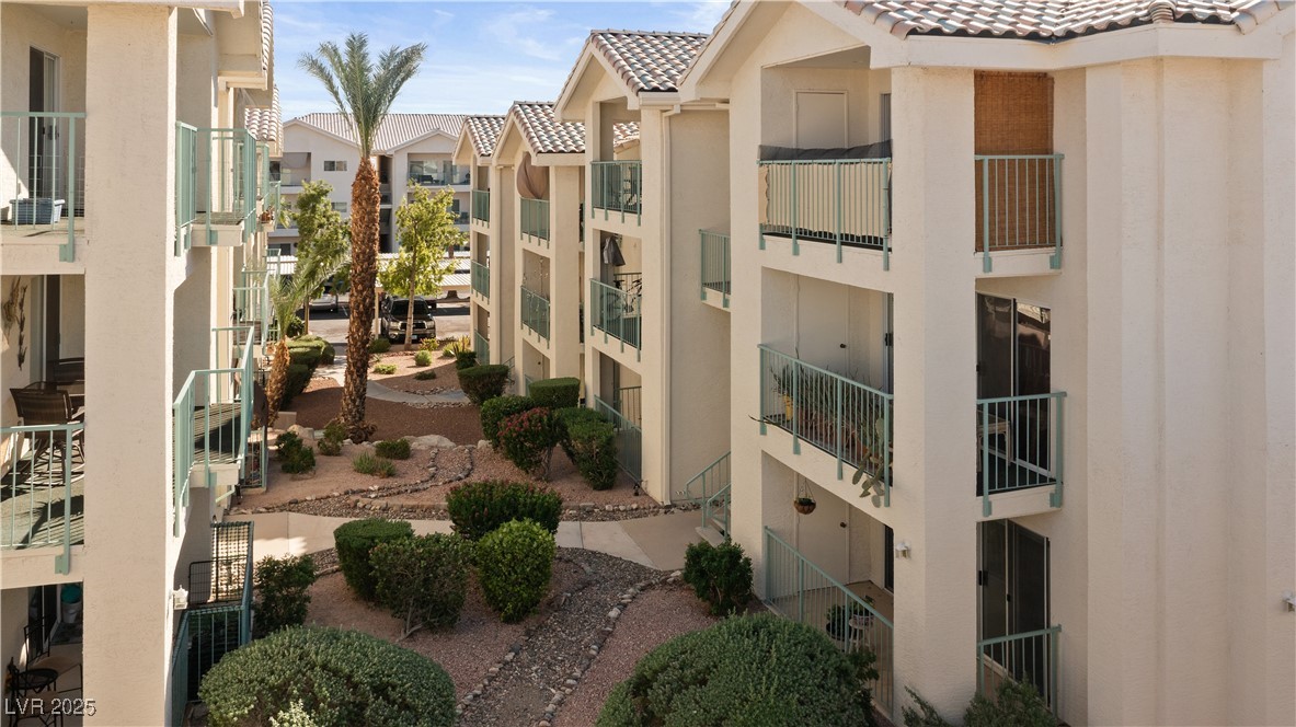3550 Bay Sands Drive, Unit 1050 Laughlin, NV 89029 - Photo 33 of 71 View of the ground floor home's building and the gated South Bay community and walkway paths between buildings