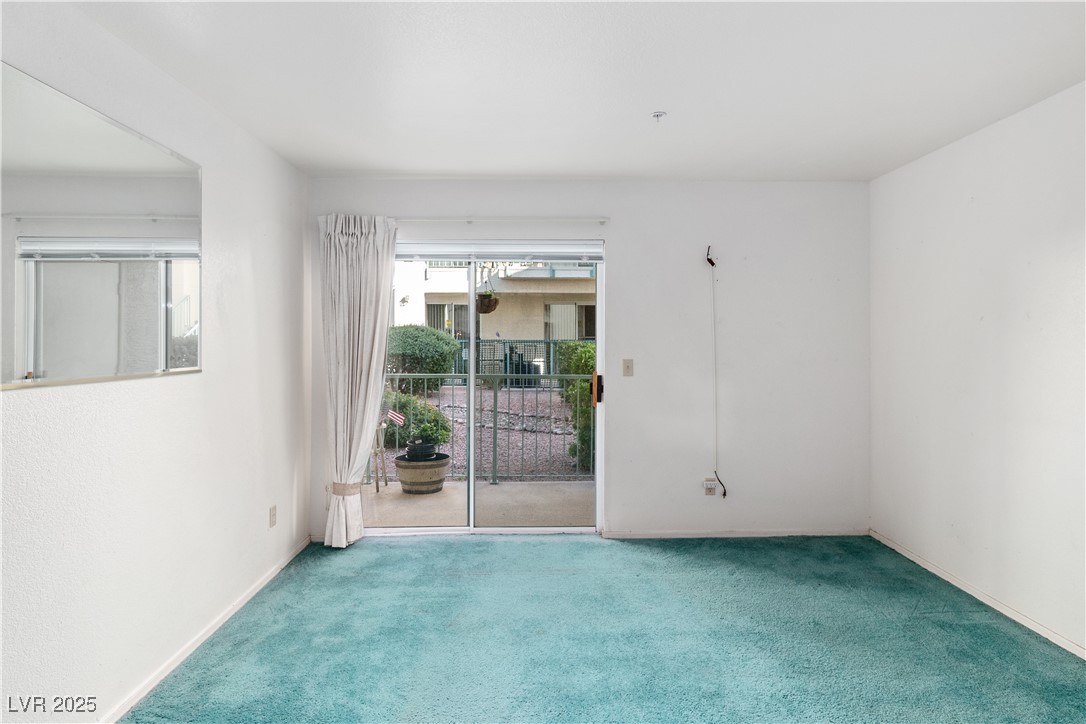 3550 Bay Sands Drive, Unit 1050 Laughlin, NV 89029 - Photo 5 of 71 Carpeted living room with baseboards