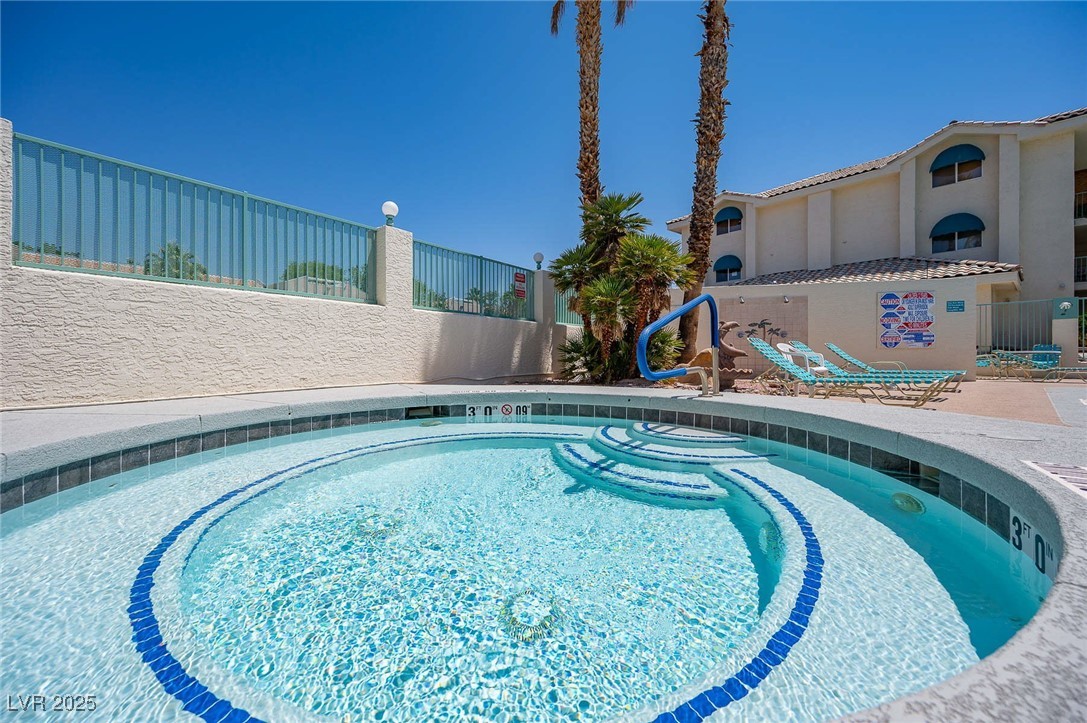 3550 Bay Sands Drive, Unit 1050 Laughlin, NV 89029 - Photo 59 of 71 View of 1st community pool featuring a hot tub, and a patio area