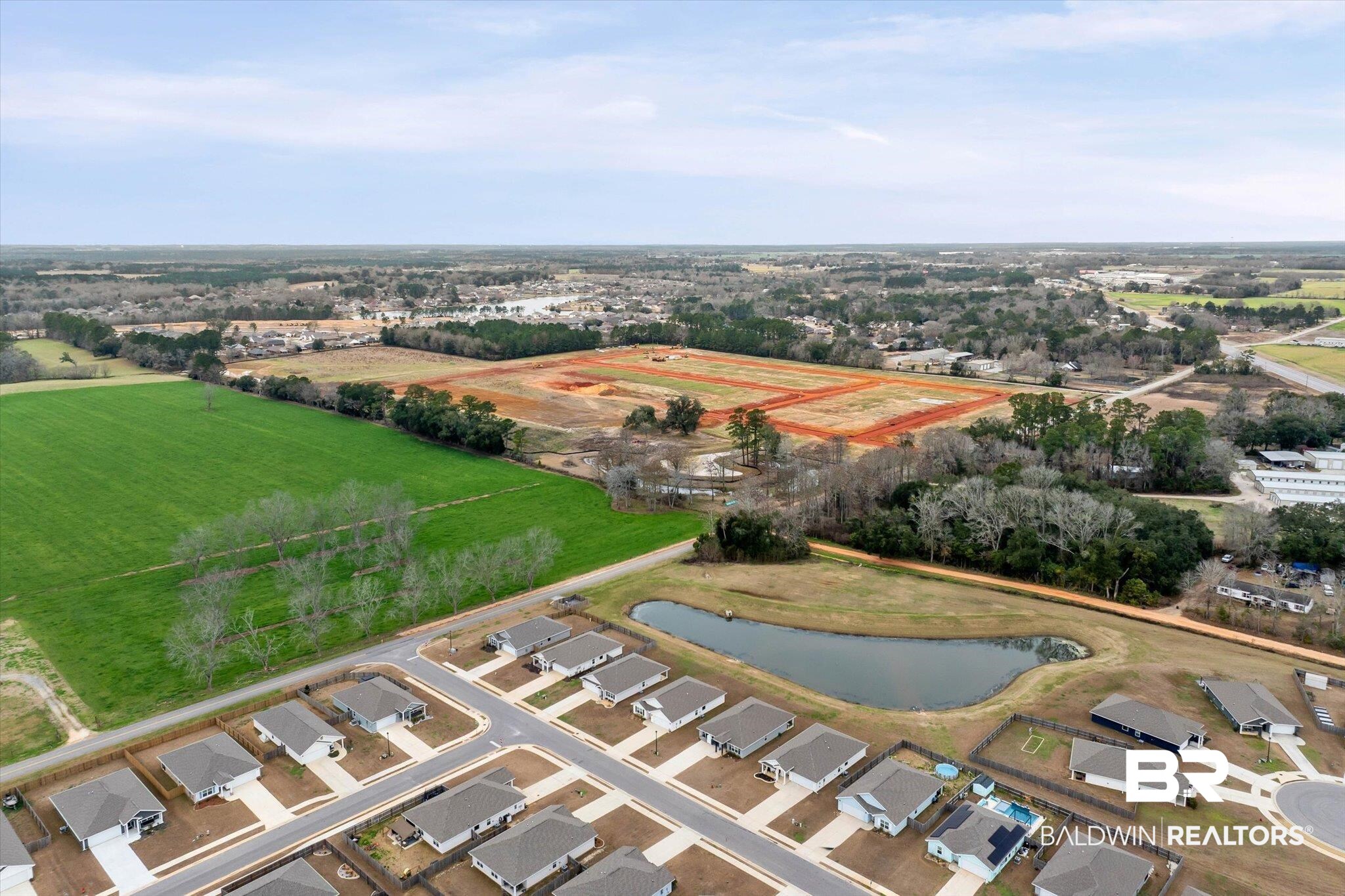17041 Muse Street Loxley, AL 36551 - Photo 38 of 44 Aerial view of residential area with a nearby body of water