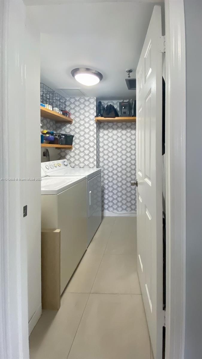859 Jeffery Street, Unit 201 Boca Raton, FL 33487 - Photo 22 of 33 a bathroom with a shower and a sink