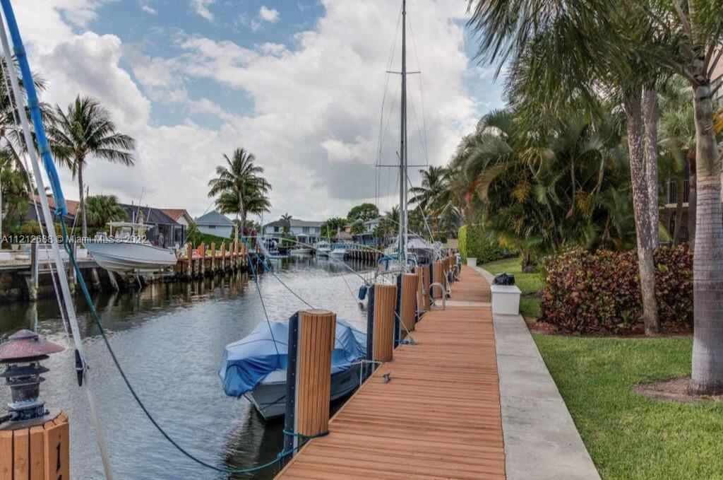 859 Jeffery Street, Unit 201 Boca Raton, FL 33487 - Photo 30 of 33 a lake view with palm trees