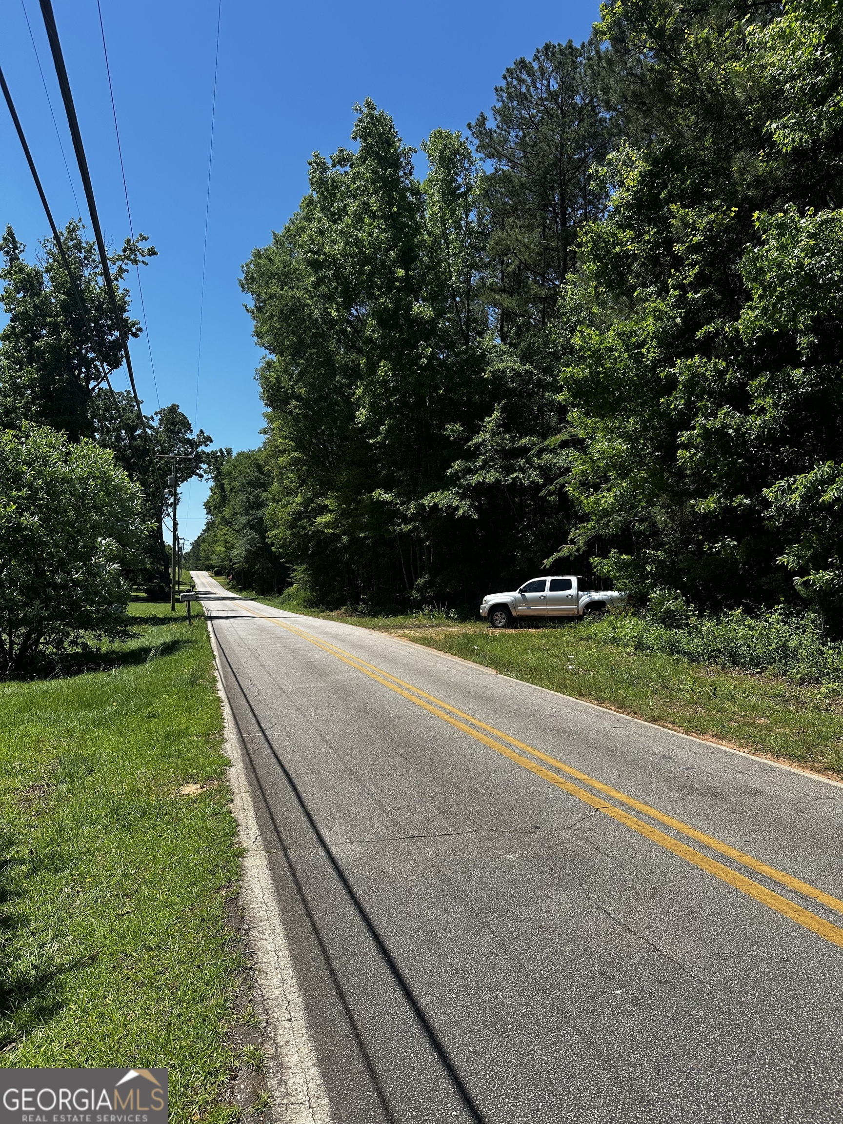 178 Barnesville Avenue Barnesville, GA 30204 - Photo 5 of 17 a view of a backyard