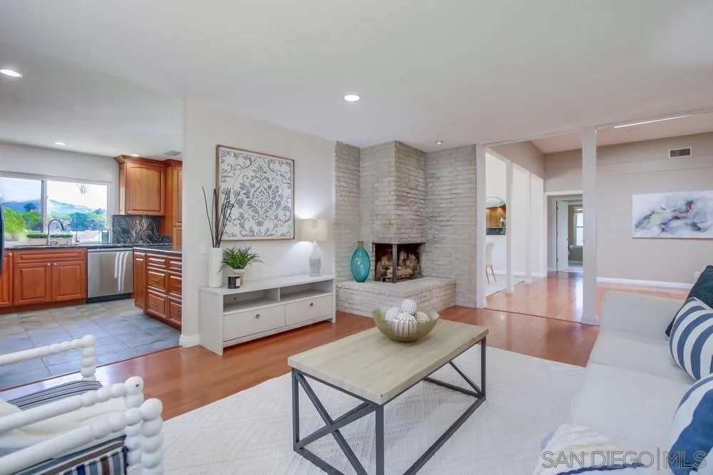 14747 Dash Way Poway, CA 92064 - Photo 13 of 65 a living room with furniture and a wooden floor