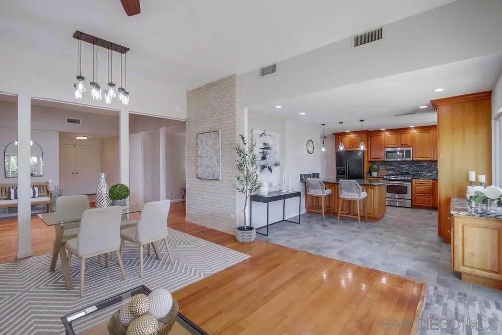 14747 Dash Way Poway, CA 92064 - Photo 14 of 65 a living room with furniture and kitchen view