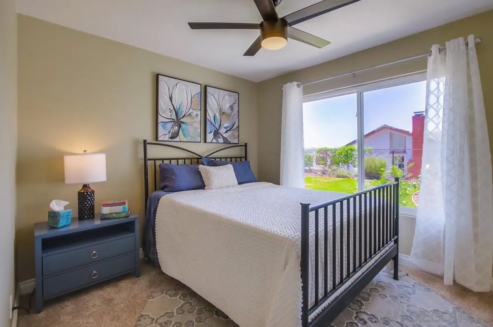 14747 Dash Way Poway, CA 92064 - Photo 24 of 65 a bed room with a bed and a window