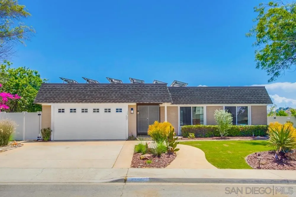 14747 Dash Way Poway, CA 92064 - Photo 40 of 65 a front view of a house with garden