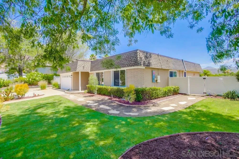 14747 Dash Way Poway, CA 92064 - Photo 4 of 65 a view of a house with a yard