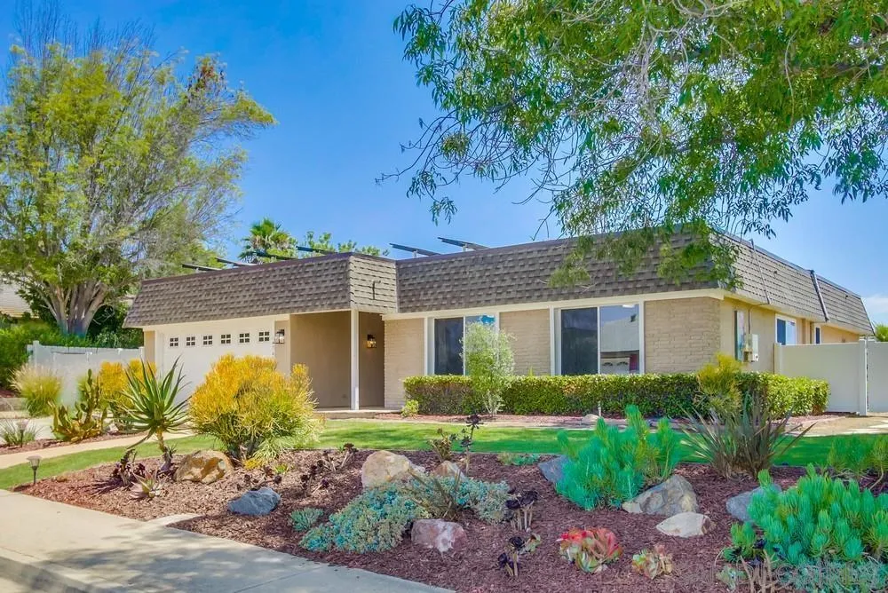 14747 Dash Way Poway, CA 92064 - Photo 41 of 65 a front view of a house with garden