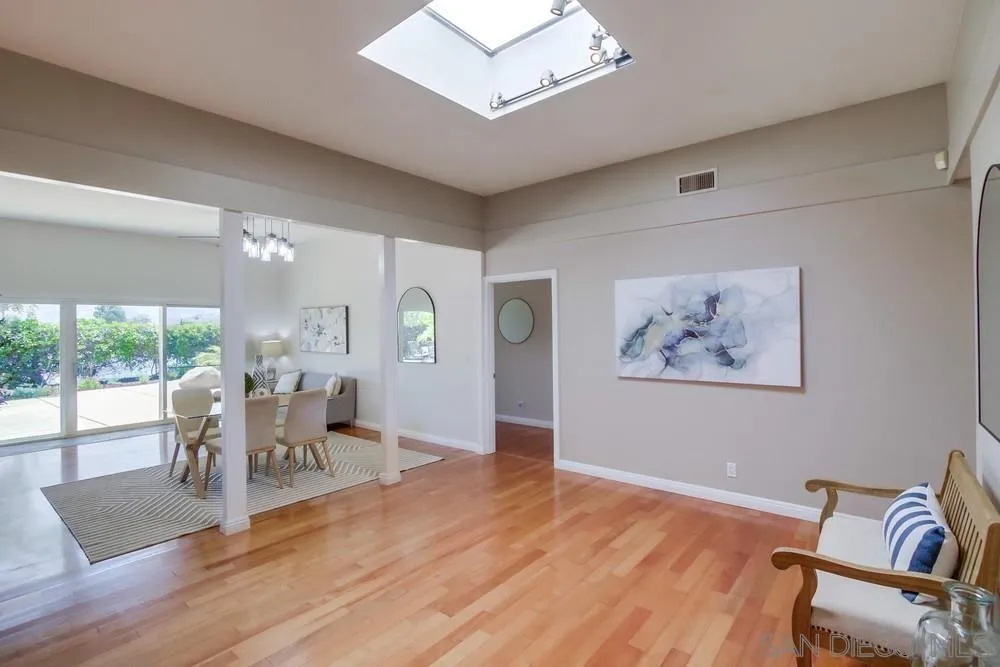 14747 Dash Way Poway, CA 92064 - Photo 43 of 65 a view of a dining room with furniture window and wooden floor