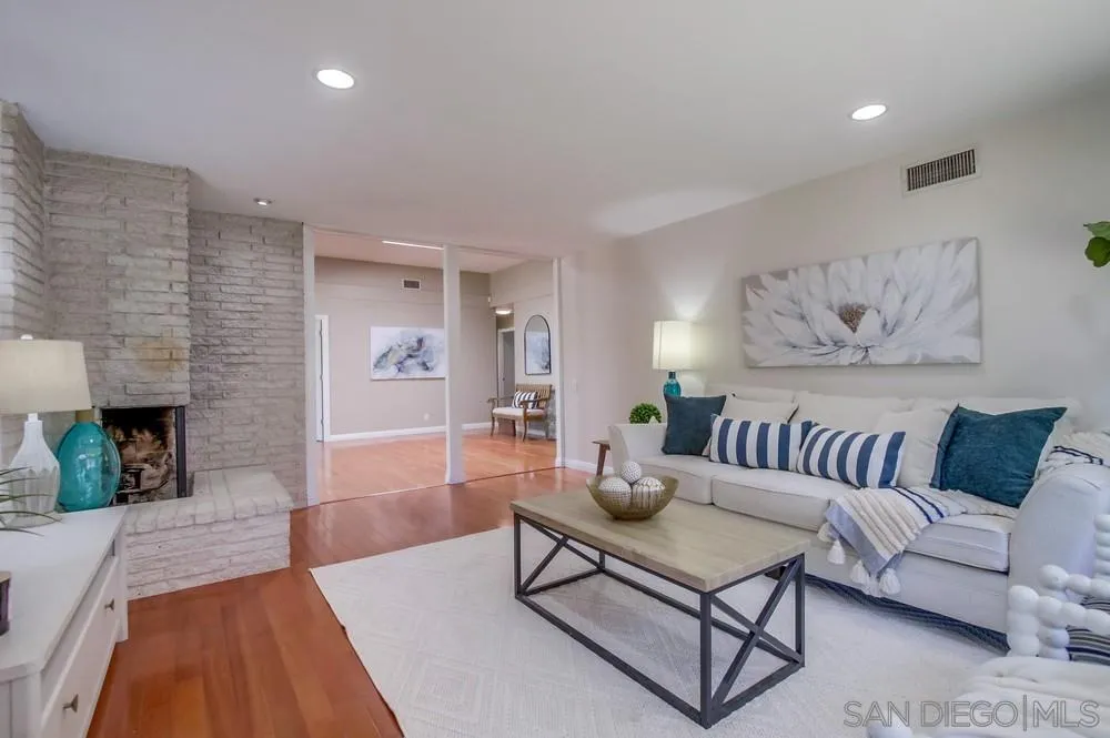 14747 Dash Way Poway, CA 92064 - Photo 45 of 65 a living room with furniture and a fireplace