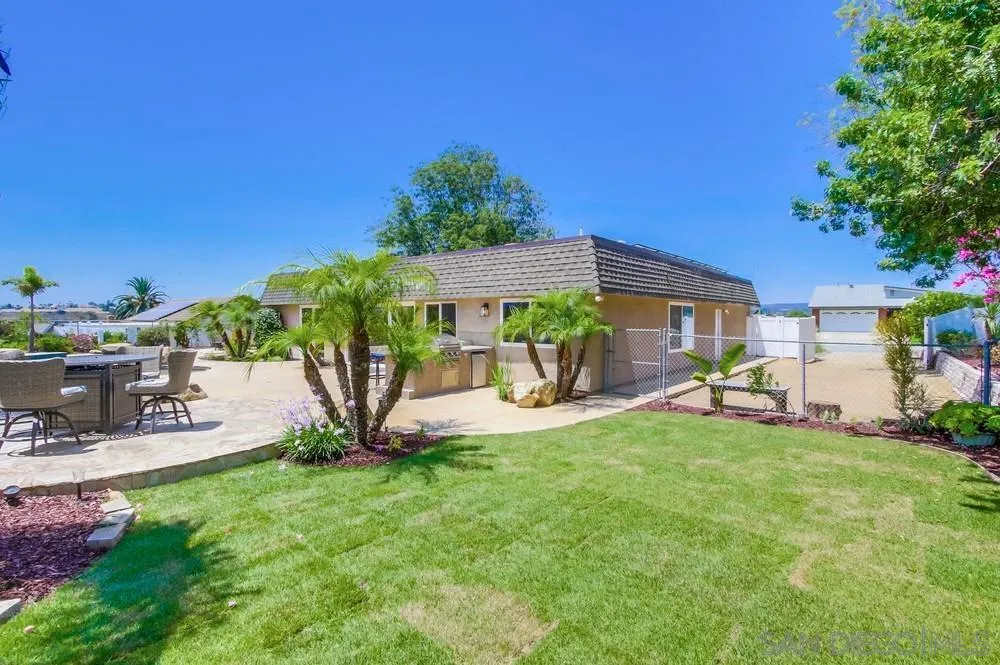 14747 Dash Way Poway, CA 92064 - Photo 61 of 65 a view of a house with backyard porch and sitting area