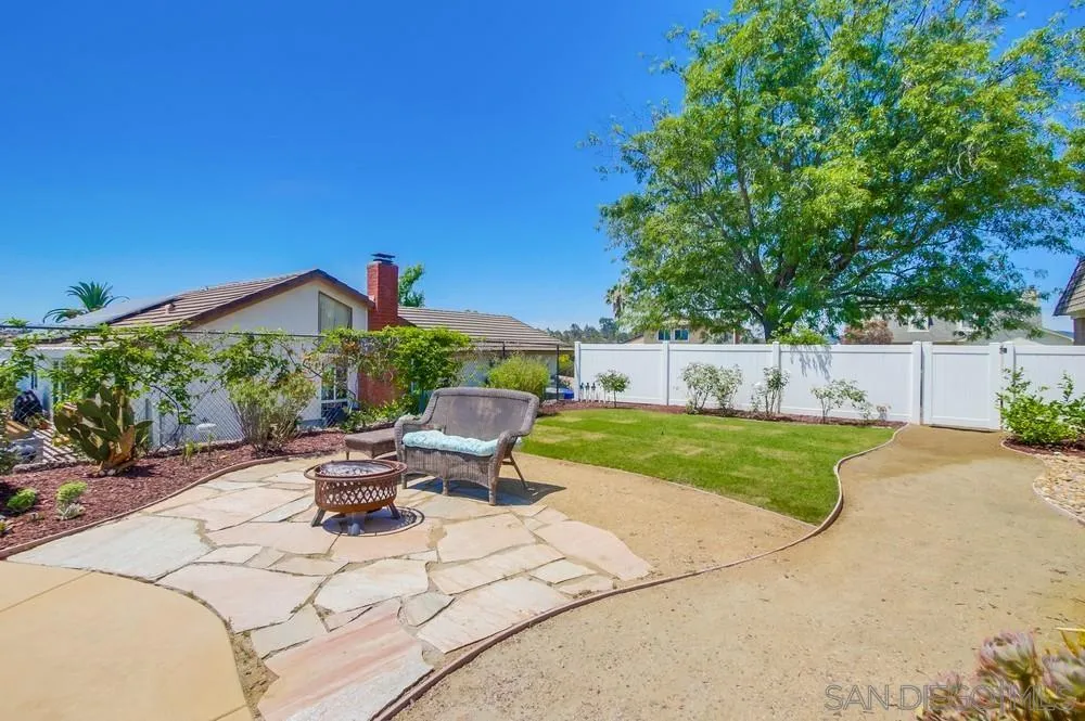 14747 Dash Way Poway, CA 92064 - Photo 62 of 65 a view of backyard with seating area and green space