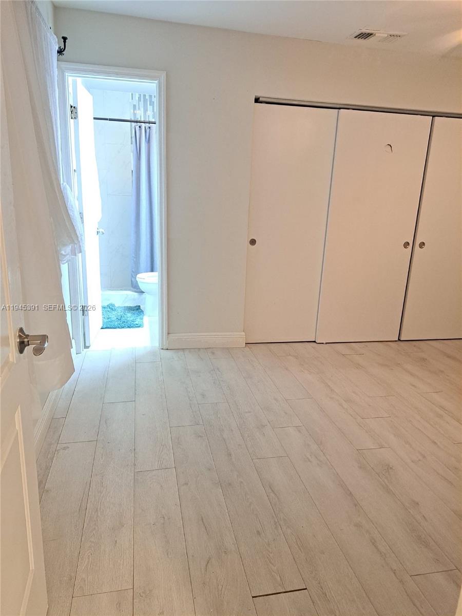 2220 North 57th Way, Unit 2 Hollywood, FL 33021 - Photo 1 of 4 a view of an empty room with a window