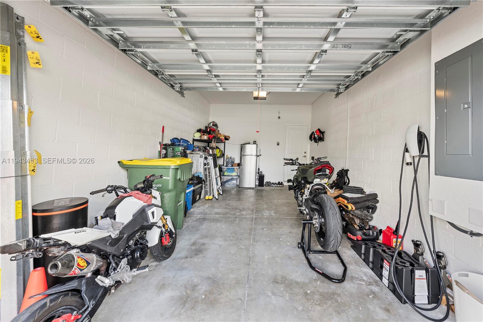 818 Southeast 17 Street, Unit 818 Homestead, FL 33034 - Photo 22 of 36 a view of a storage room with a lot of stuff