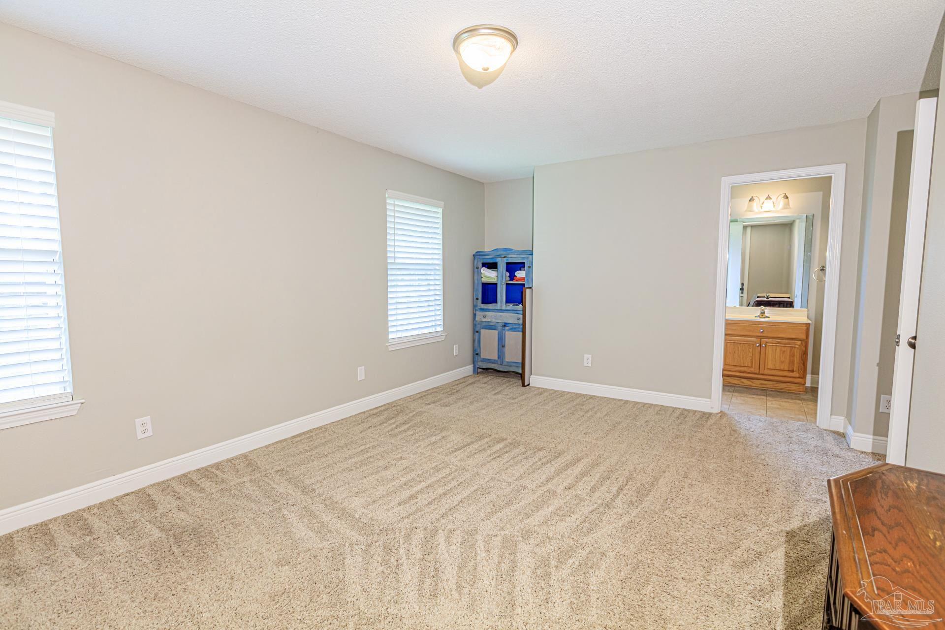 2863 Wallace Lake Road Pace, FL 32571 - Photo 23 of 44 a view of an empty room