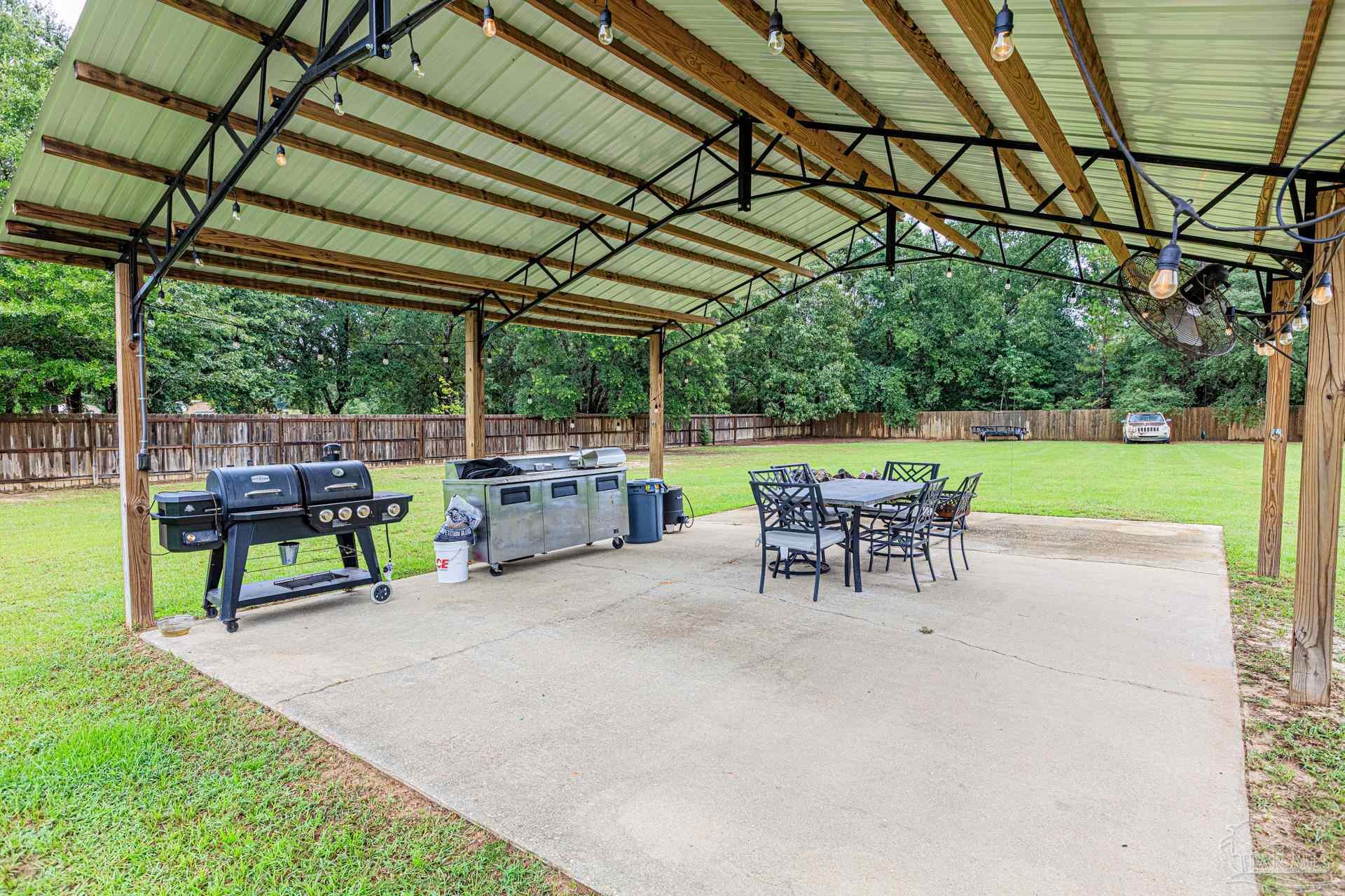2863 Wallace Lake Road Pace, FL 32571 - Photo 33 of 44 a view of outdoor space with seating