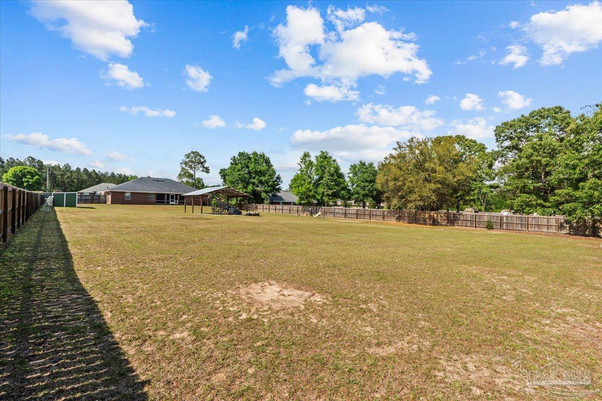 2863 Wallace Lake Road Pace, FL 32571 - Photo 34 of 44 a view of an ocean and city