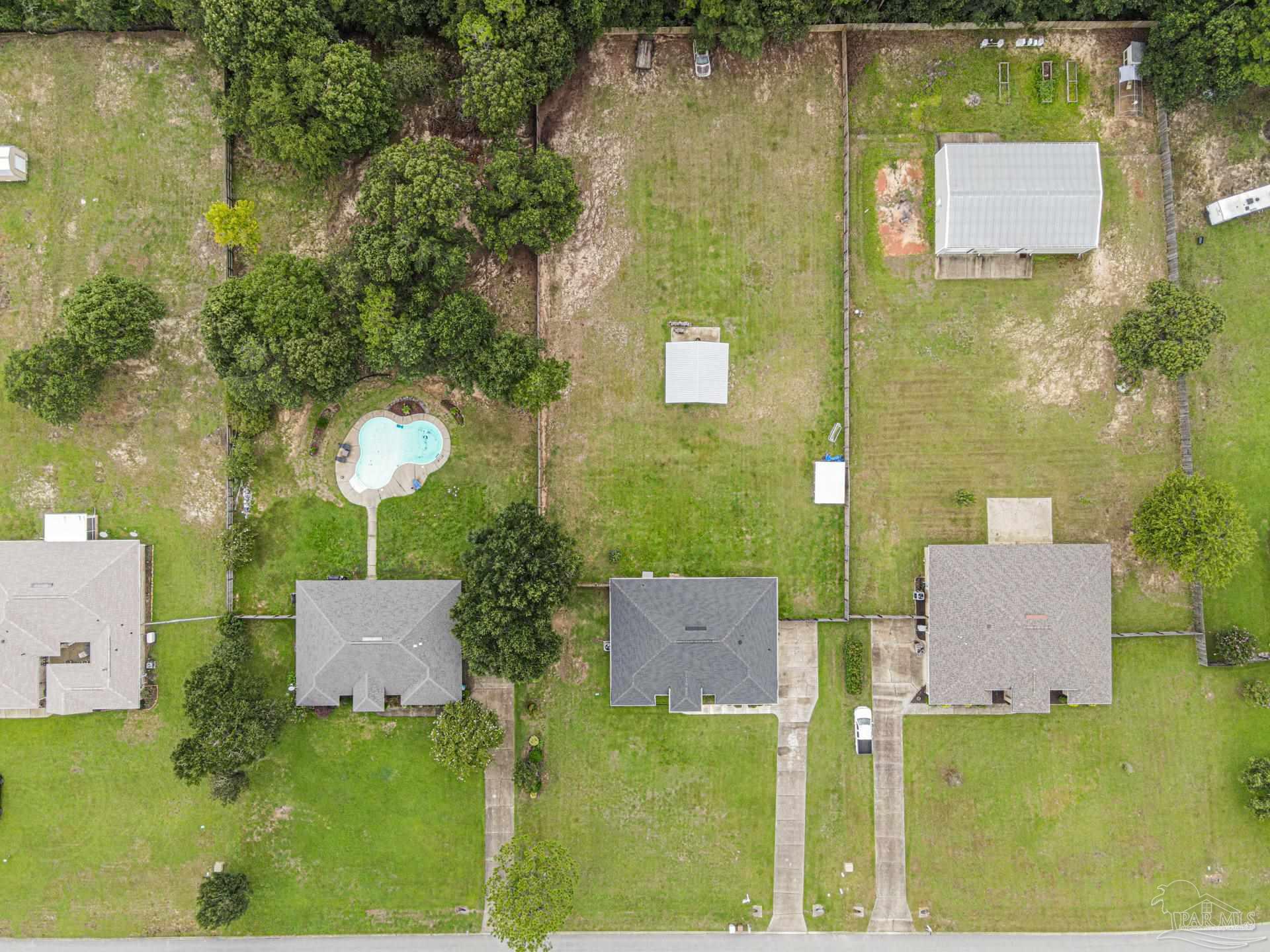 2863 Wallace Lake Road Pace, FL 32571 - Photo 43 of 44 aerial view of a house with a yard and a fountain