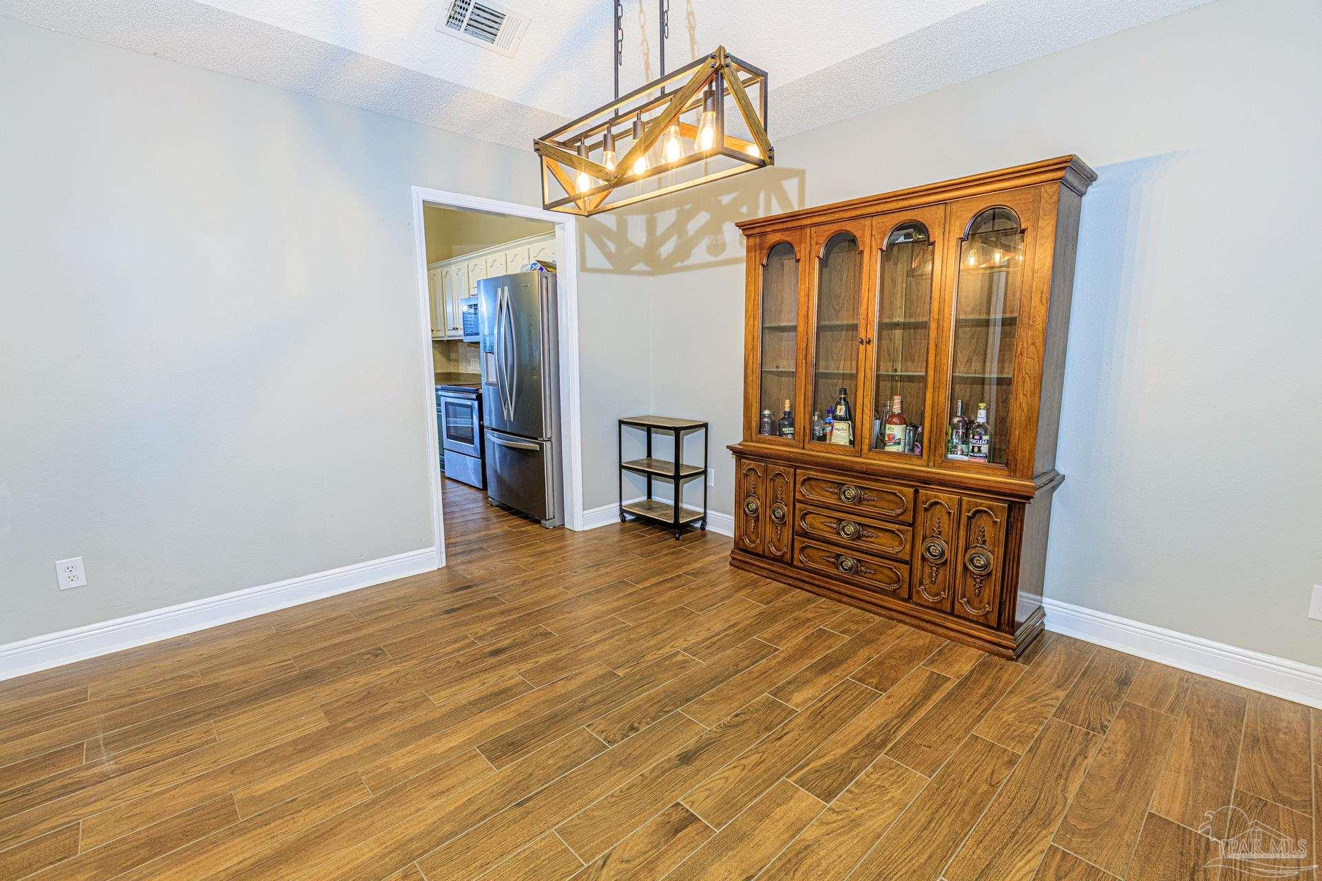 2863 Wallace Lake Road Pace, FL 32571 - Photo 5 of 44 a view of a storage & utility room