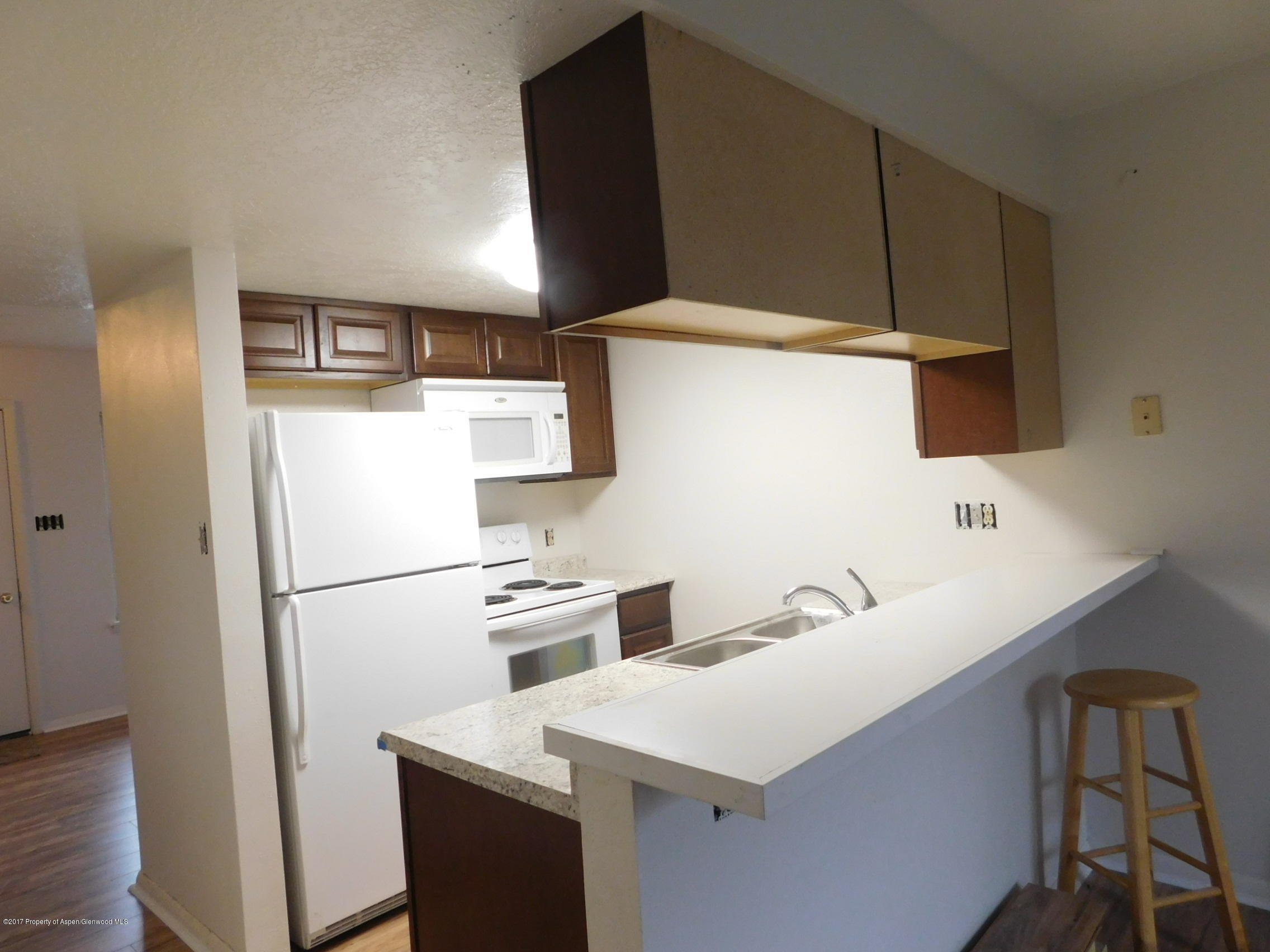 1393 West 2nd Street Craig, CO 81625 - Photo 3 of 16 a utility room with dryer and washer