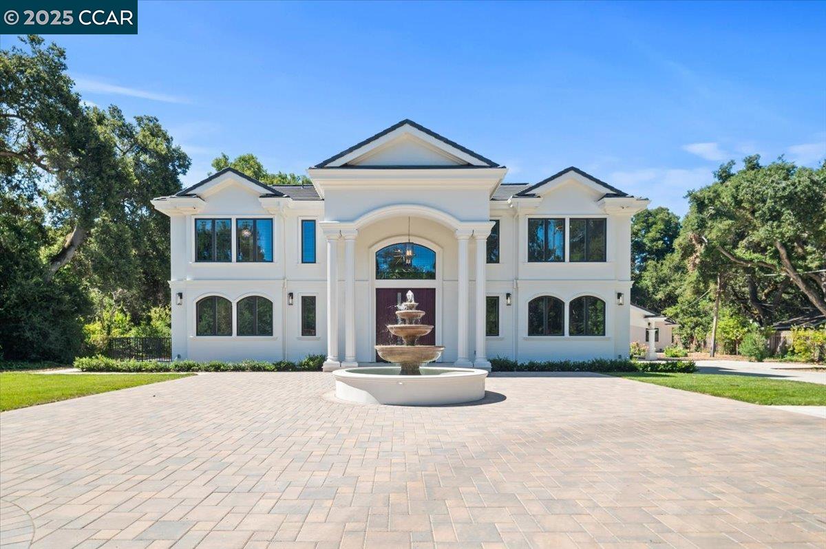 74 Middlefield Road Atherton, CA 94027 - Photo 2 of 51 a front view of a house with a yard