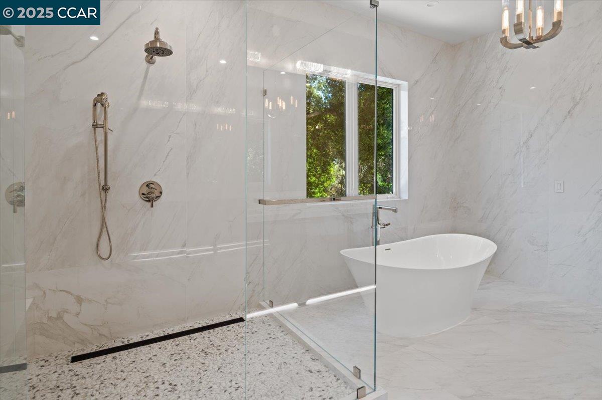 74 Middlefield Road Atherton, CA 94027 - Photo 25 of 51 a bathroom with a shower and a sink