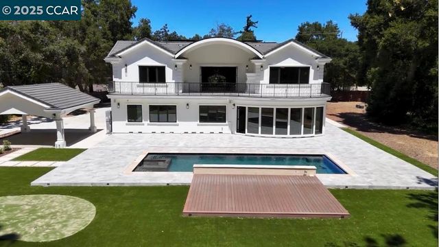 a view of a terrace with a yard