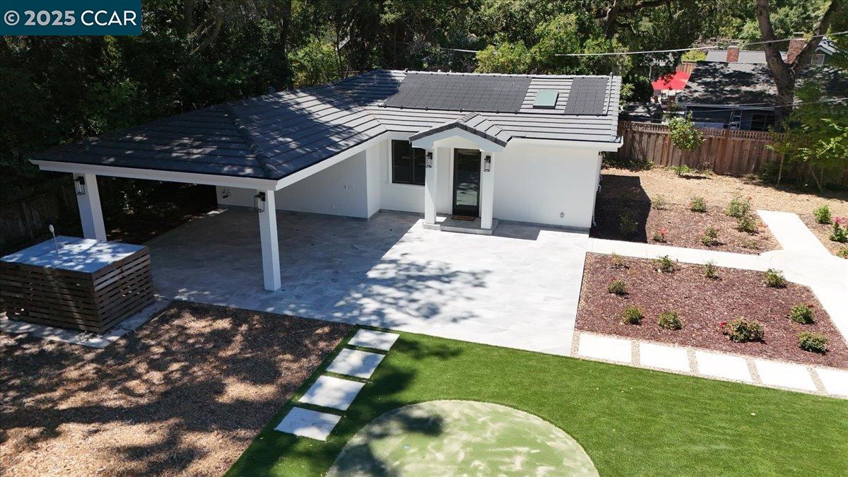 74 Middlefield Road Atherton, CA 94027 - Photo 44 of 51 a view of a terrace with a yard