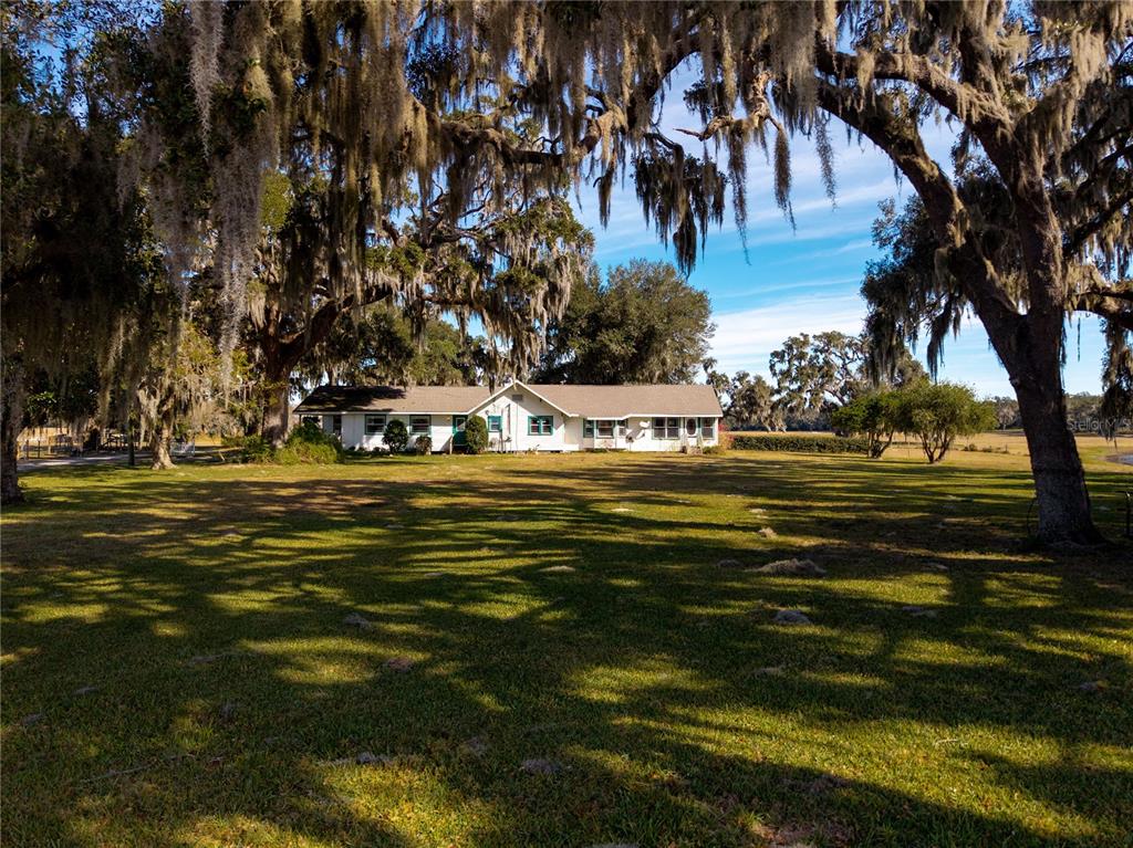 9504 Fort King Road Dade City, FL 33525 - Photo 41 of 51 a view of a ocean with lots of trees
