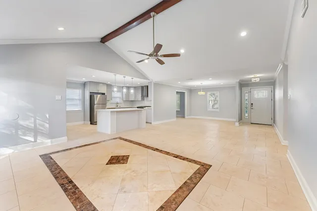 a view of kitchen with cabinets and wooden floor