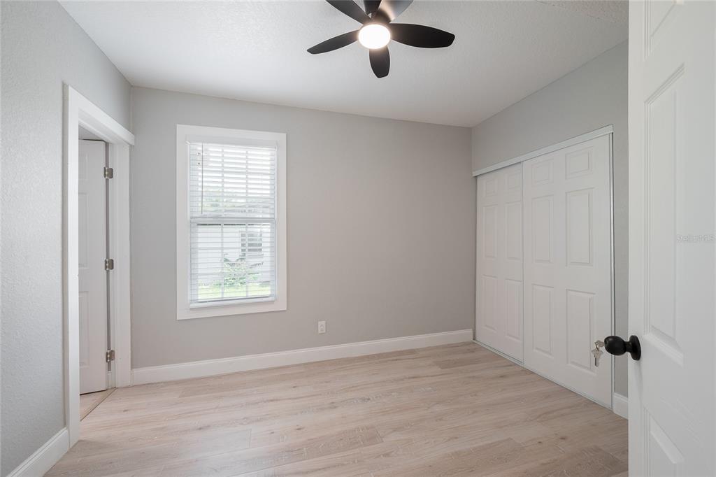 922 Delaware Avenue St. Cloud, FL 34769 - Photo 11 of 31 a view of an empty room with a window