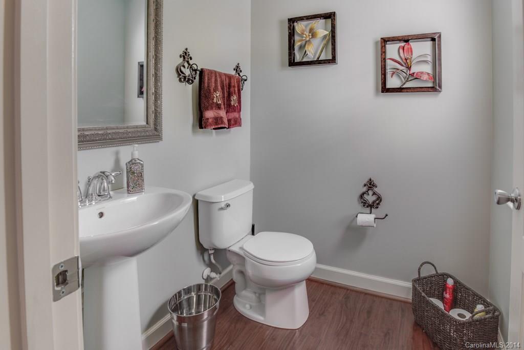 4411 Kiddle Lane Monroe, NC 28110 - Photo 15 of 24 a bathroom with a toilet and a sink
