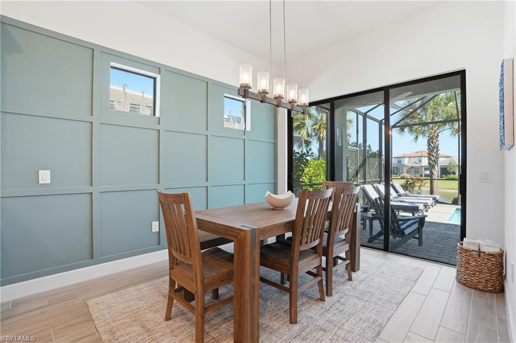 1872 Terreno Boulevard Naples, FL 34120 - Photo 17 of 50 a view of a dining room with furniture window and outside view